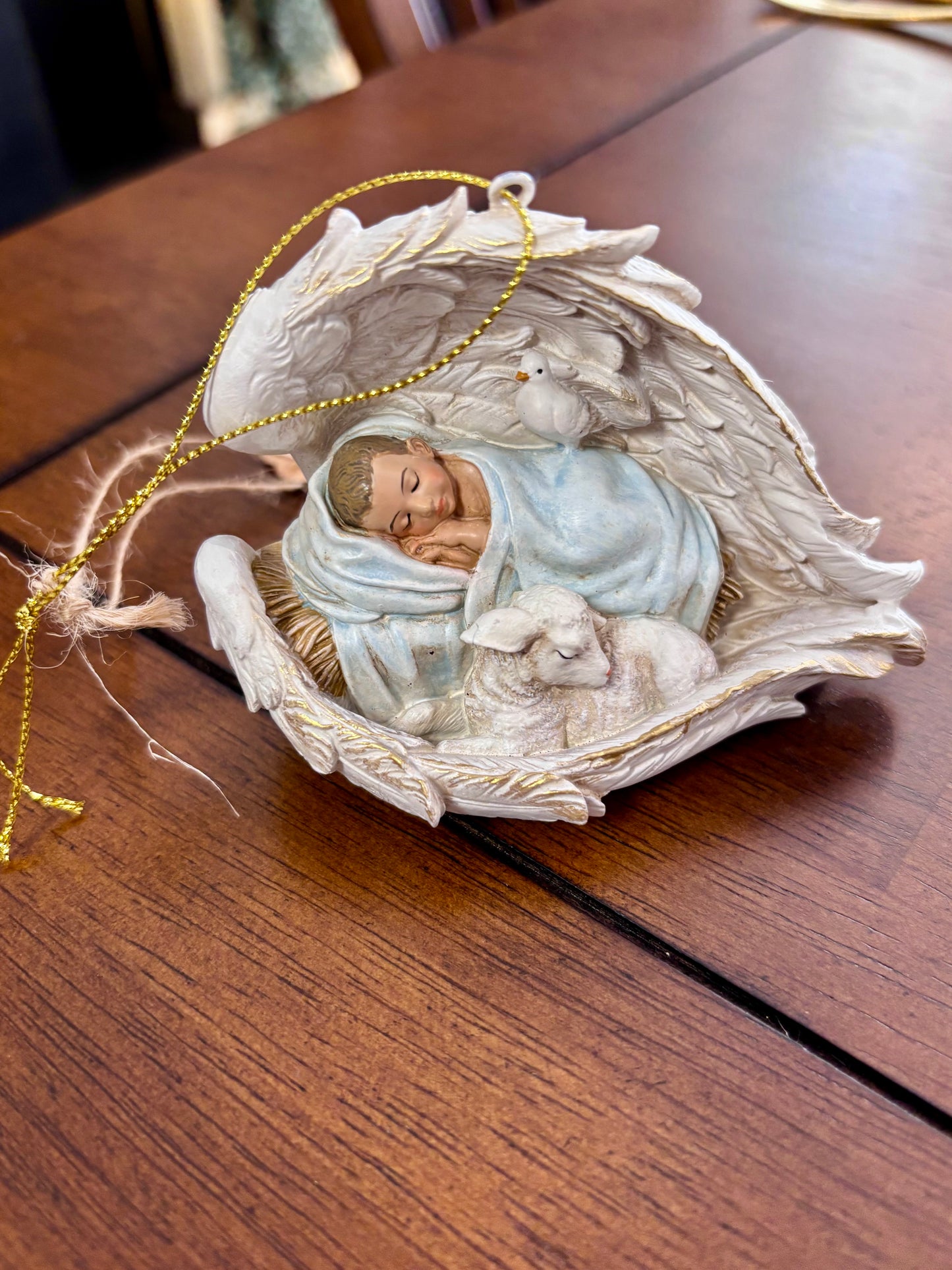 Christ Child Sleeping in Wings Ornament